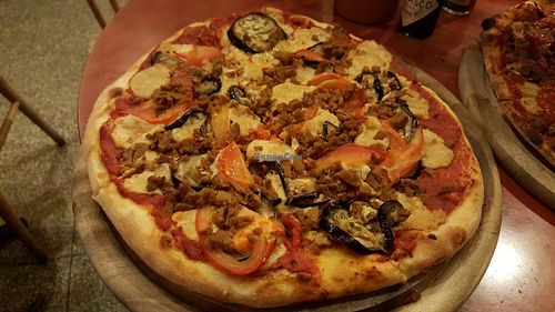Seitan, eggplant and tomato pizza (with cashew cheese) at Hatool HaYarok - The Green Cat in Tel Aviv