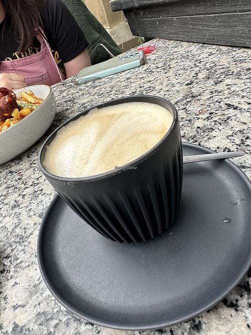 Oat milk flat whitee  at The Village in Maryland