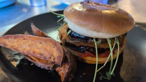 Eggplant burger with tomato jam and a side of sweet potatoes at Kool Beanz Cafe in Tallahassee