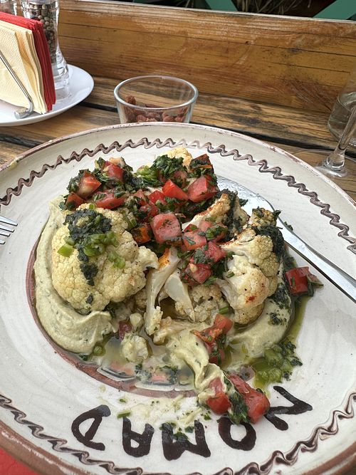 Roasted cauliflower with hummus  at Nomad Sky Bar in București