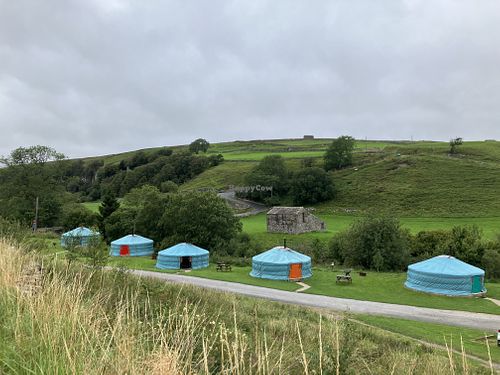 Yurts with coloured doors   at Keld Bunkbarn and Yurts in Keld