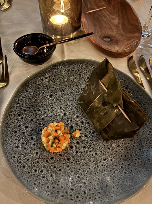 Entree with an Indonesian mais ‘polenta’ and spiced oystermushrooms steamed in banana leaves, served with home made sambal  at Waber. in Overijssel