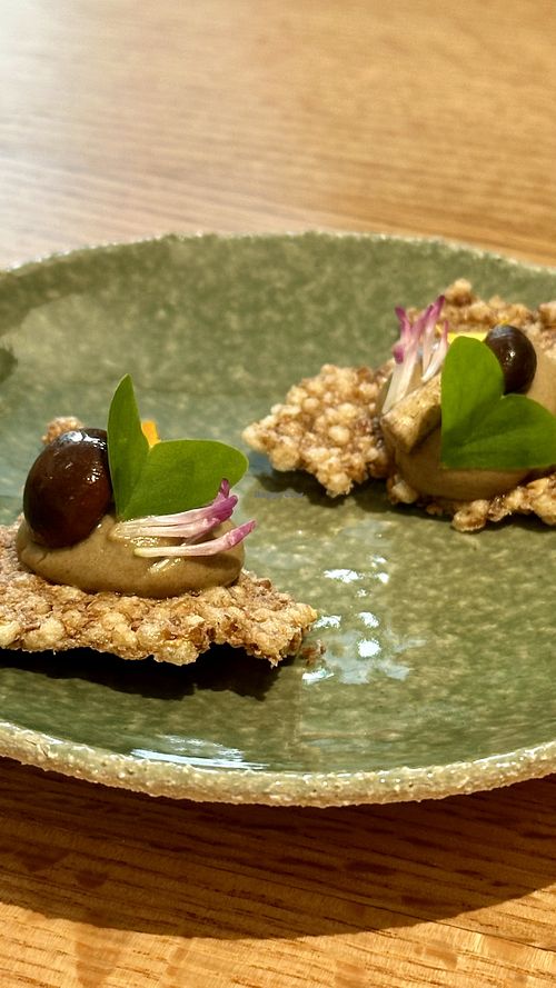 Buckwheat cracker with smoked eggplant pulp  at Trèfle in Lyon