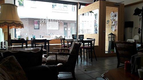 Cute interior featuring two cats at Cafe Schnurrke in Cologne