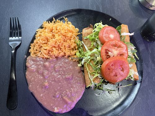 Vegan potato flautas with refried beans and rice  at Maya Halal Taqueria in Union City