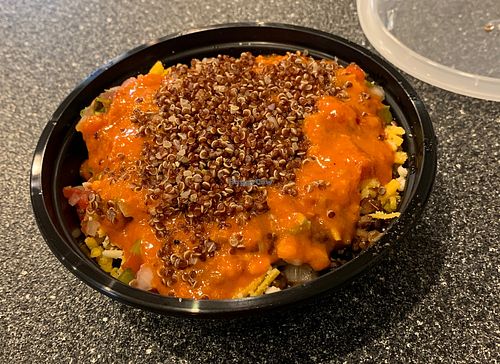 Tofu bowl with rice & beans, smoky tofu, quinoa, pico, vegan cheese.  at MudDaddyFlats in Troy