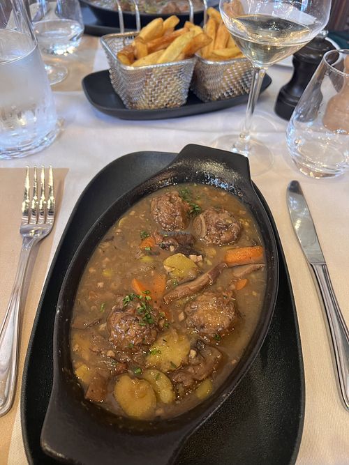 The meatball stew with a side of fries  at The Steakhouse in île-de-france