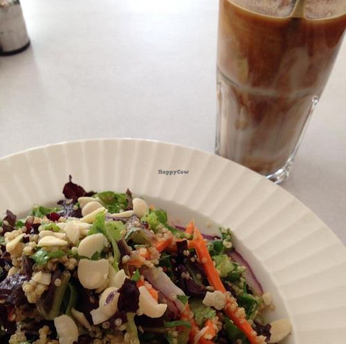 Vegan Curly Salad and Vegan Ice Coffee with Nut Milk at Cafe Nini in Tel Aviv