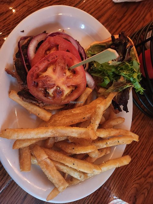 Portobello burger subbed with Beyond burger minus the cheese and house sauce.

Includes tomoto, spring veggies, onion, avocado and the side of fries. at The Ugly Dog Public House - Highlands in Highlands