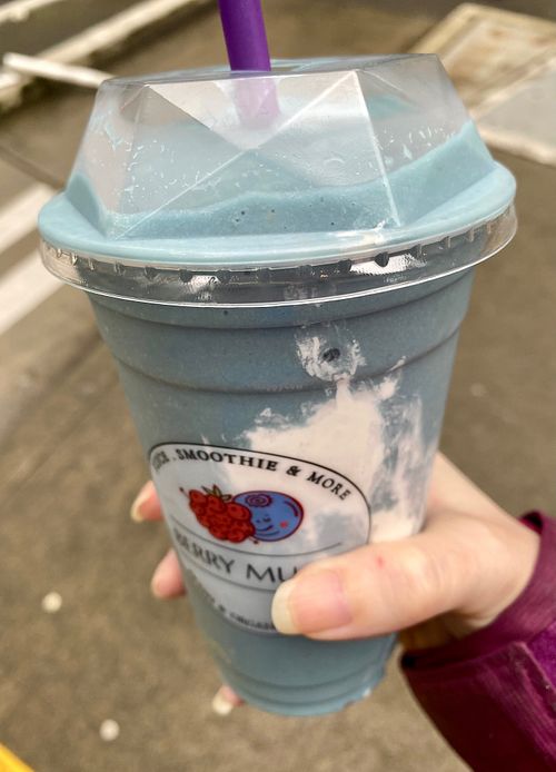 Cloudy sky smoothie (mango, banana, spirulina, oat milk, blue agave) at Berry Much in Seattle