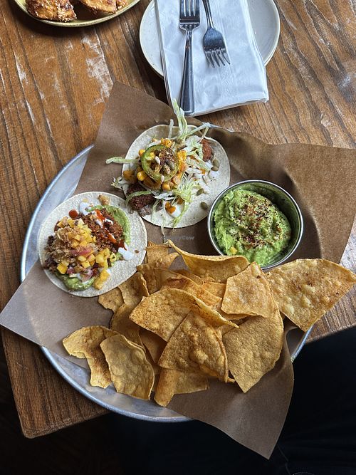 Sweet potato taco, vegan chorizo taco, chips and guac  at La Carnita in Toronto