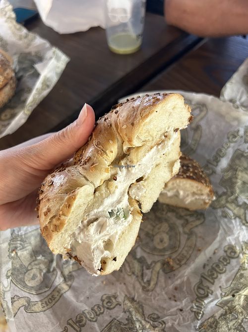 Garlic bagel with tofu scallion cream cheese  at Bagel Pub - University Place in New York