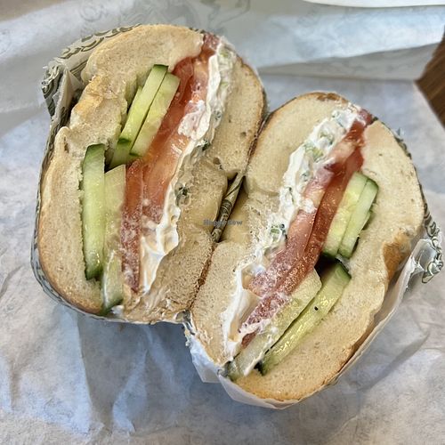 Tofu scallion cream cheese, tomato, and cucumber on a plain bagel  at Bagel Pub - University Place in New York