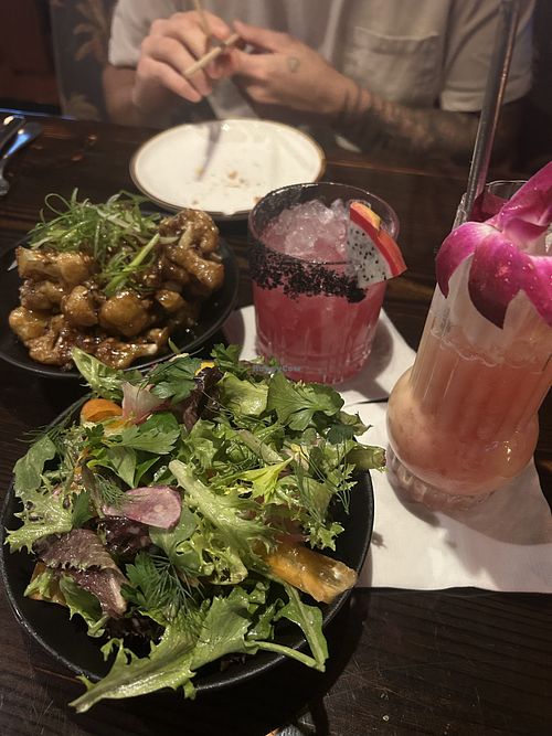 Sweet and sour cauliflower and harvest salad- get the paradise punch mocktail!  at Driftwood in Boynton Beach