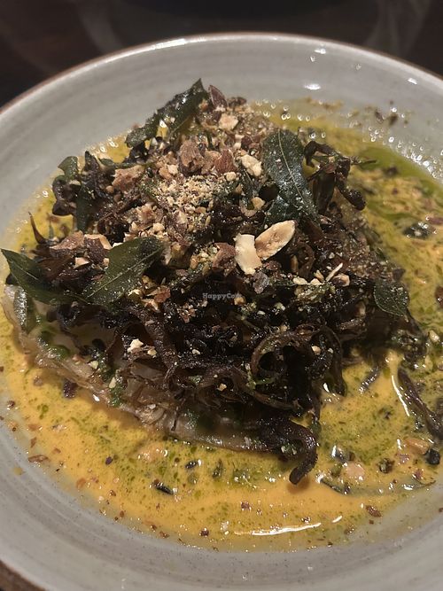 Cabbage red curry with mushrooms and crispy curry leaves   at Driftwood in Boynton Beach