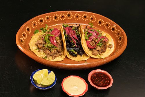 Carnitas, birria, pastor and hibiscus you can choose the flavor the order comes with (3 pcs) hand-made tortillas. at El Tesorito de Jalisco in Mexico City