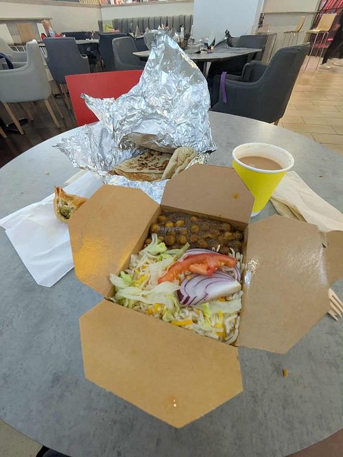 Chana, rice, salad, samosa and nan-bread. Plus non-vegan masala chai. at Tapori Curry Bar in Beaconsfield