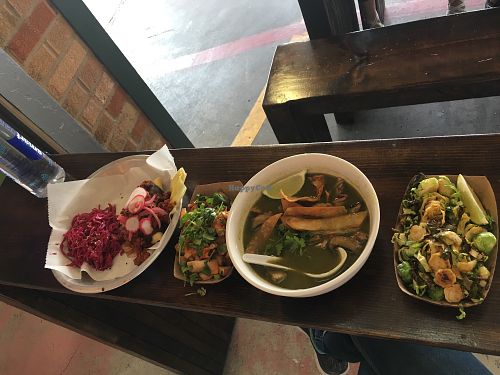 tamale with soy chorizo, patatas (no sour cream), hominy stew, Brussels sprouts at The Bite in Kansas City