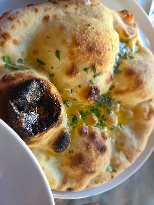 Vegan garlic pizza bread with parsley at Bosco Pizzeria in England