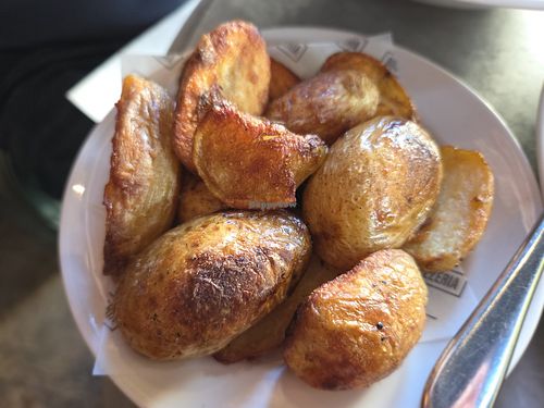 Vegan rosemary roasted potatoes at Bosco Pizzeria in England