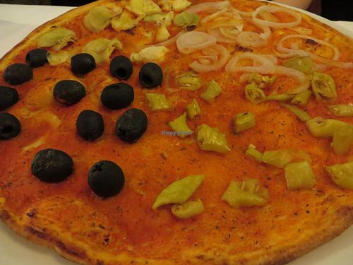 # 109 Pizza Quatro Stagioni (with olives, pepper, artichokes, and onions) (with vegan dough and without cheese) at Pizzeria-Restaurant Punjab in Saarbrucken