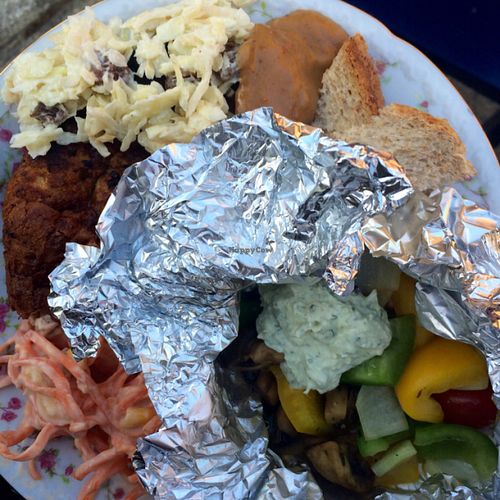 own salads, their awesome burger on the left at Spare-A-Rib  Vegan BBQ in Gemert