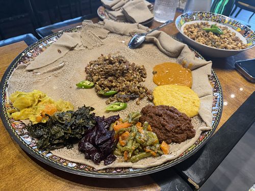 Veggie Combo for one with Mushroom Kitfo in the center  at Feru Ethiopian Cuisine in Washington