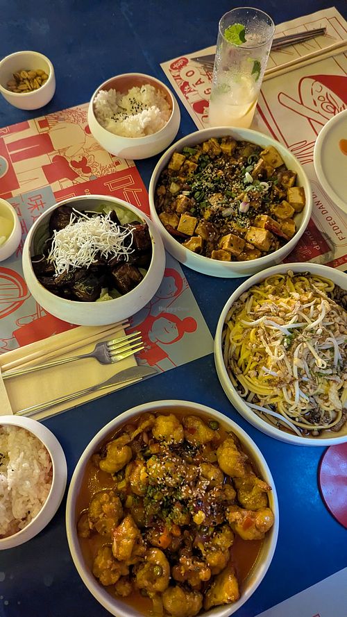 Eggplant, Mapo tofu, peanut nooles, and cauliflower at GĀO in Buenos Aires