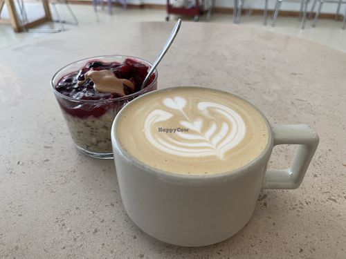 Peanut butter jam overnight oats + Latte  at von&vonnie microroasters in Porto