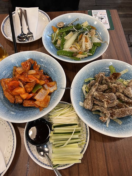 Sweet and sour bean curd, vegetables with garlic, mock duck to eat with cucumber, leek and wrap (not on the picture).   at Dragon Oriental Restaurant in Manchester