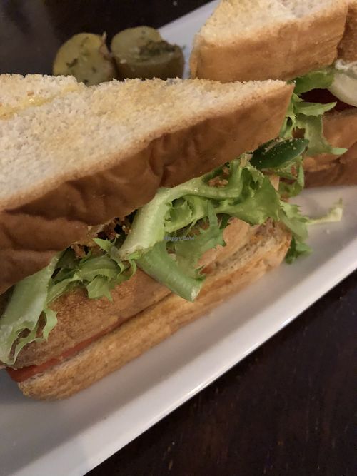 Three-storey bacon sandwich   at Vegan Rock in Sevilla
