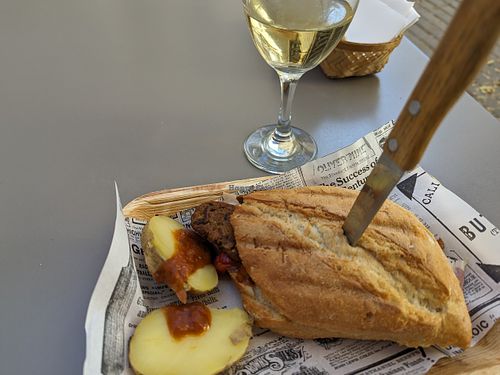 Brioche bun with chorizo, bacon and red peppers at Vegan Rock in Sevilla