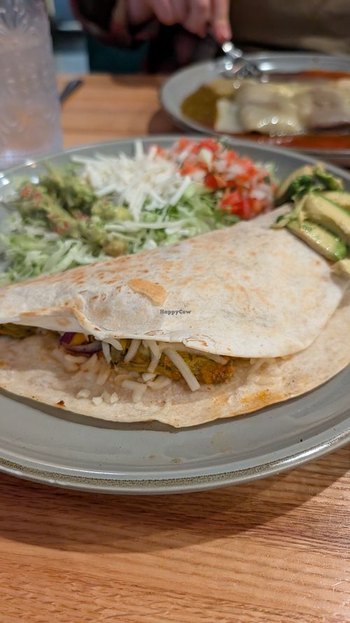 Vegan quesadilla with vegan cheese and zucchini flowers. at Mextizo in Cedar Rapids
