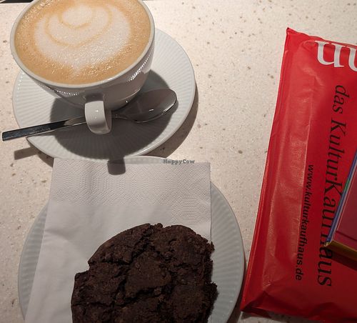 Chai Latte w Oat milk & vegan chocolate cookie at Kultur Kafé in Berlin