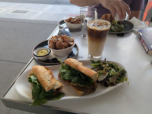Vegan Pesto Sandwich: Roasted Eggplant, Sun dried Tomato Walnut Pesto, Almond Milk Ricotta, Avocado, Caramelized Onions & Spinach.

Roasted Potatoes 

Vanilla Latte with Oat Milk at Baguette Cafe in Las Vegas