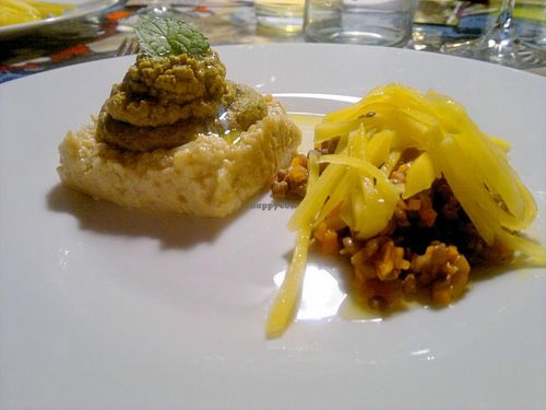 Tortino di miglio con crema di melanzane e lenticchie con avocado at Yoo Restaurant in Perugia