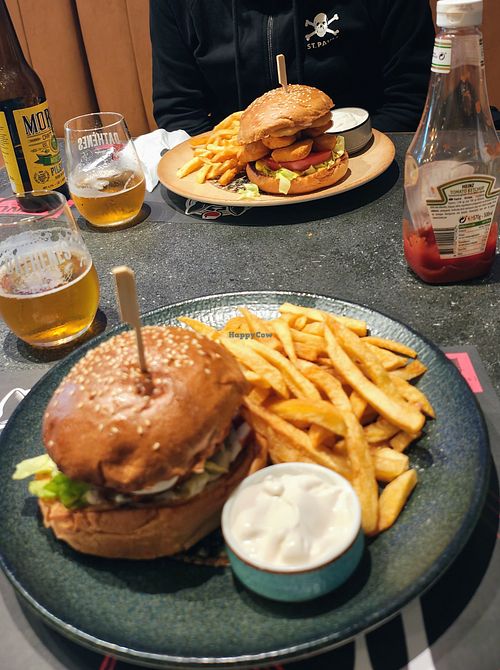 In front the plant based burger and behind the chicken free burger at Drunk dog in Tripoli