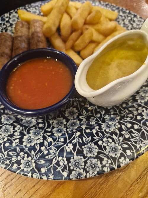 Sausage, beans, chips and curry sauce at The John Wallace Linton - JD Wetherspoon in Newport