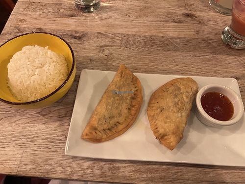 Veggie empanadas w/jasmine ricee  at Jasmine's Caribbean Cuisine in New York
