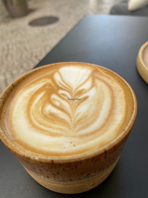 Flat with with pea vegetable drink at Tiger & Chick - Coffee and Delights in Lisboa