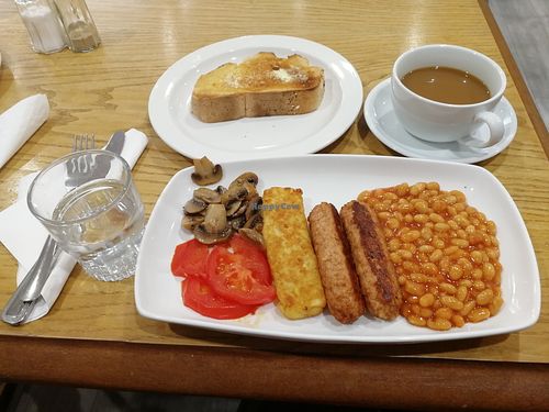 Vegan breakfast with Linda McCartney sausages, hash browns, mushrooms, beans, tomatoes, toast and a soy latte.

Delicious food, friendly service and I loved the idea of a table for people who didn't know each other, to share if they wanted to.  at Meeting House Cafe in Liverpool
