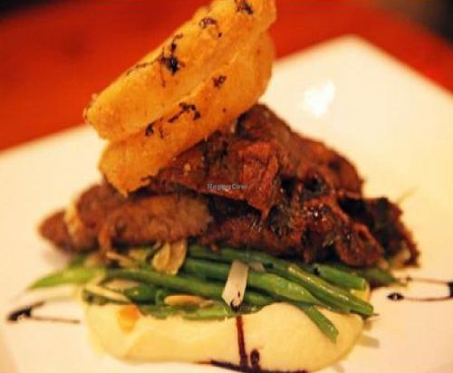 Black Pepper & Balsamic Grilled Seitan: sauteed haricots verts, leeks, almonds, cornmeal crusted onion rings, celeriac puree at Candle 79 in New York City