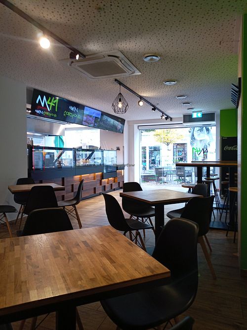 Vegan options promoted on screen & indoor seating at Main41 in Sachsen