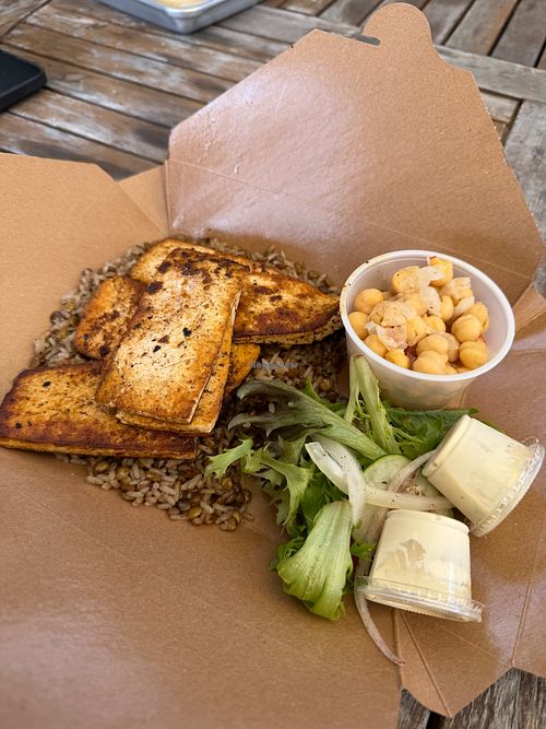 Tofu shawarma, lentil rice, chickpea salad with greens and tahini  at House of Hummus Mediterranean Cafe in Cumming