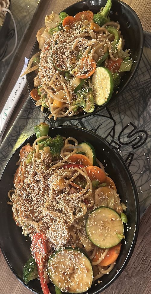 I payed for one large bowl but after cooking it fit into two.  at YC's Mongolian Grill in Gilbert