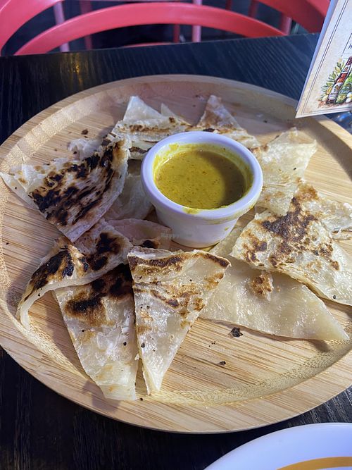Roti - love the accompanying curry sauce, but underdone   at New Thai Elephant in San Mateo