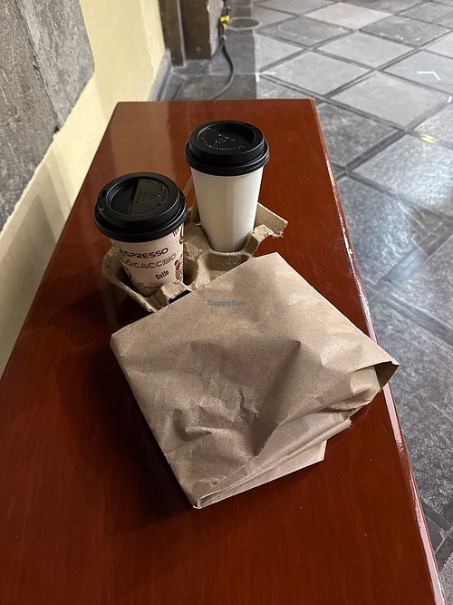Early morning veggie ciabatta + Americano + karat with oat milk. Yummy  at La Foule Cafetería  in Ciudad De México