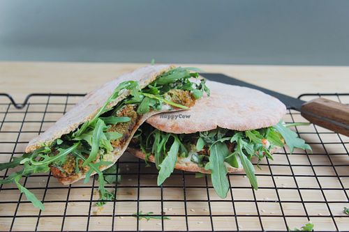 Greek Fusion
Crispy falafel, roasted red peppers, avocado mousse, rocket, aioli &  mustard, fresh coriander on a pita.
  at The Roots in Queenstown