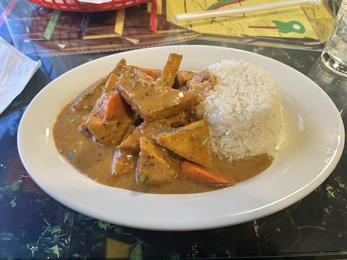 Vegan Tofu Curry and Rice  at High Grade Foods Jamaican Restaurant and Bar in Colorado Springs