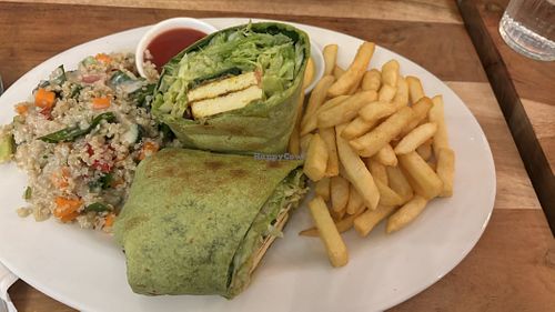 Tandoori wrap with chips and salad  at Radhey Chai Bar in Fitzroy